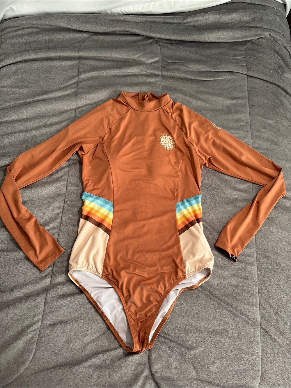 Rip Curl Rust Long-Sleeve spf 50+ One-Piece with Rainbow Stripe Accents Sz M
